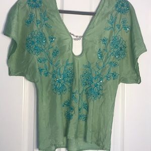 Gorgeous light green top with embroidery in blue